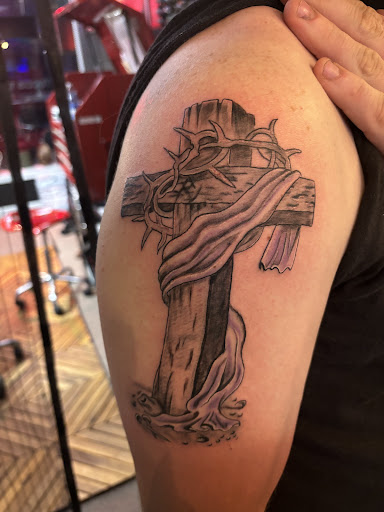 Explore spider man tattoo ideas, creative tattoo ideas in Bloomsburg, available at Tuccis Tattoo & Piercings Studio