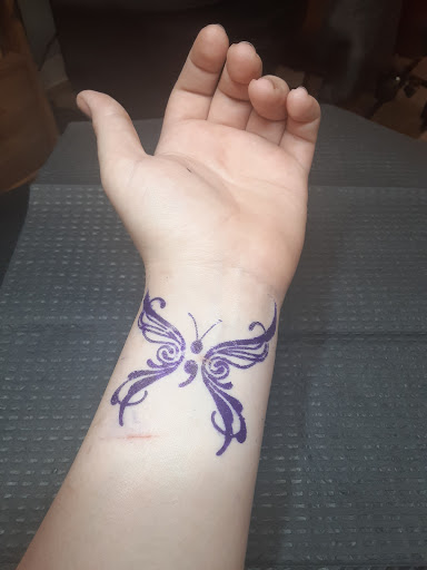 Explore baptism tattoo ideas, creative tattoo ideas in Cape Coral, available at South of Heaven Tattoo