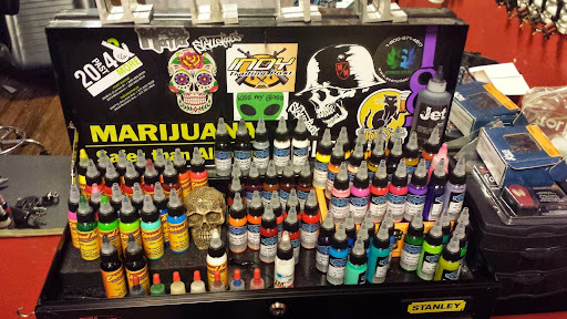 Explore lily tattoo ideas, creative tattoo ideas in Noblesville, available at Mystic Images Tattoo Co.