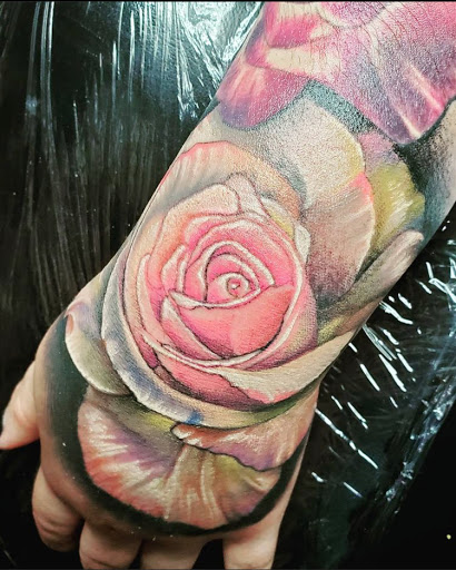 Explore broken clock tattoo ideas, creative tattoo ideas in Houston, available at RS3 Studios