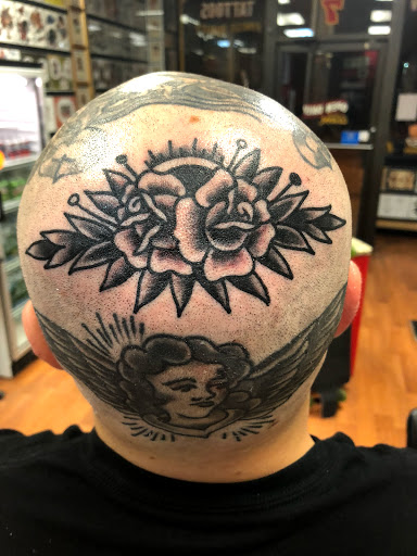 Explore cute dinosaur tattoo ideas, creative tattoo ideas in Concord, available at Sterling Tattoo Club