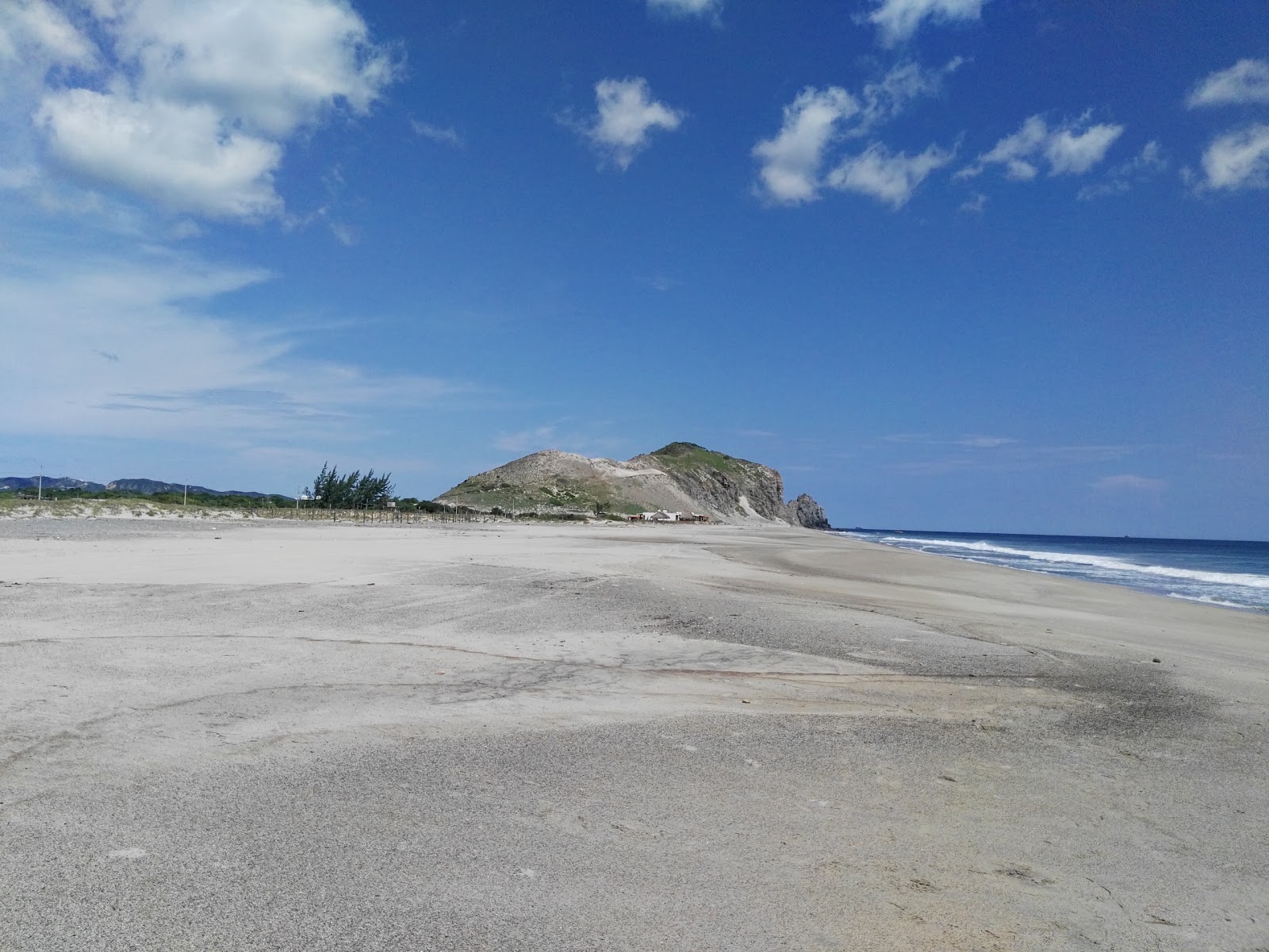 Fotografija Guelaguechi beach in naselje