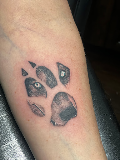Explore foot print tattoo ideas, creative tattoo ideas in Davenport, available at Tooth & Nail Tattoo & Piercing