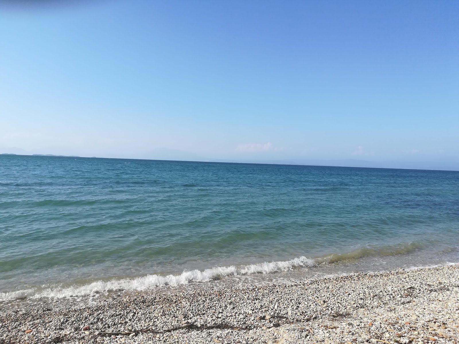Foto von Porticciolo beach mit sehr sauber Sauberkeitsgrad
