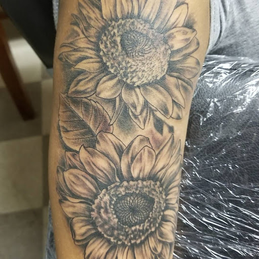 Explore small dog tattoo ideas, creative tattoo ideas in Keyport, available at Taboo Tattoos