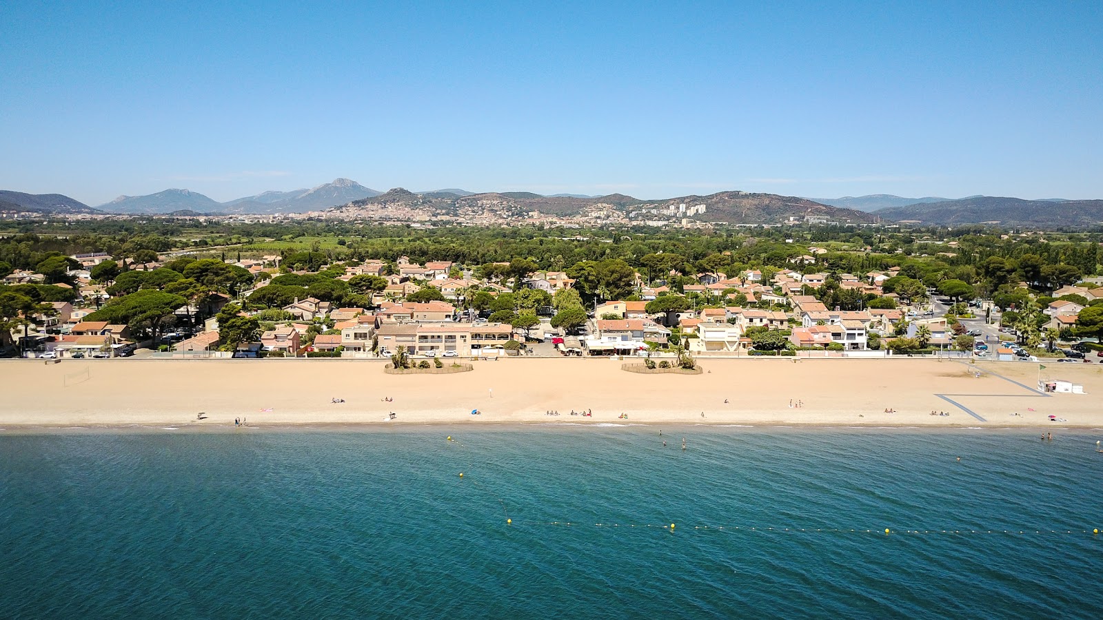 Foto de Praia de Ayguade e o assentamento