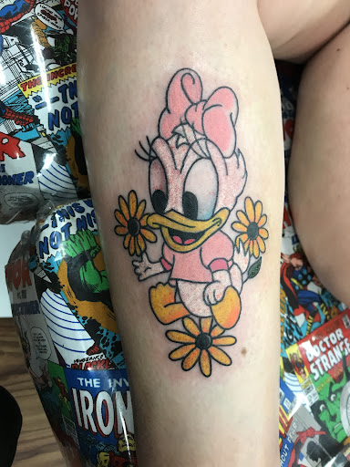 Explore female stomach tattoo ideas, creative tattoo ideas in Lake Isabella, available at Sacred heart tattoo