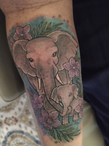 Explore black men tattoo ideas, creative tattoo ideas in Crystal River, available at Americas Best Tattoos