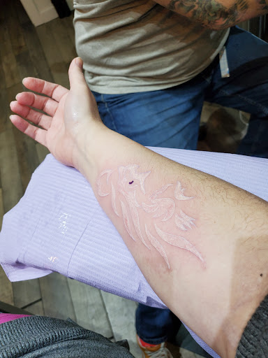 Explore family portrait tattoo ideas, creative tattoo ideas in Avon, available at Avanti Tattoo