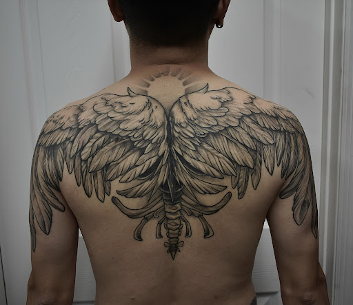 Explore matching tattoos for father and son ideas, creative tattoo ideas in Myrtle Beach, available at Tiki Tattoos