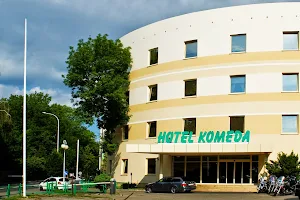 Komeda. Hotel. Restauracja. image