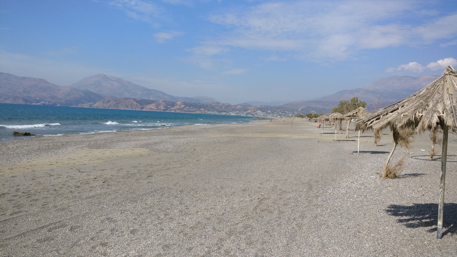 Photo of Afrathias beach - popular place among relax connoisseurs