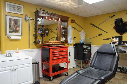 Explore lion and cub tattoo ideas, creative tattoo ideas in Foley, available at Black Sheep Custom Tattoos and Piercings