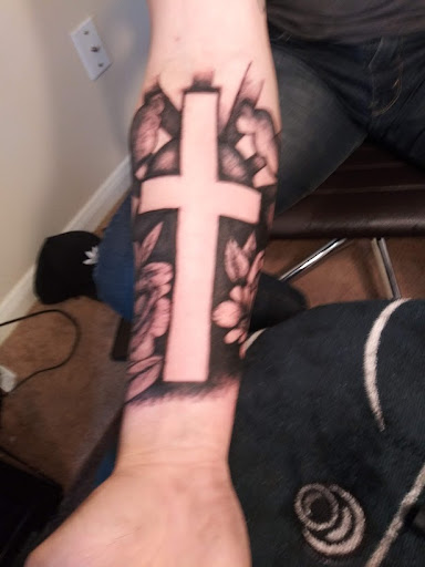 Explore 90s cartoon tattoo ideas, creative tattoo ideas in Stafford, available at Tattooz By King