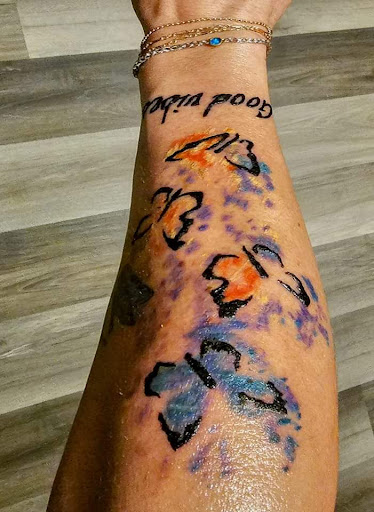 Explore snowboard tattoo ideas, creative tattoo ideas in Green Bay, available at SPITFIRE CREATIONS