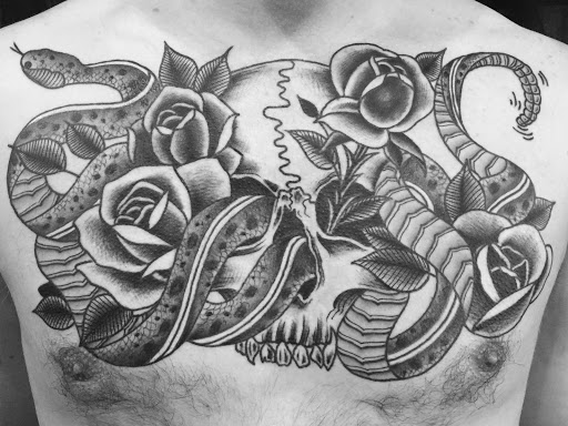 Explore rock tattoo ideas, creative tattoo ideas in Reno, available at Aces Tattoo