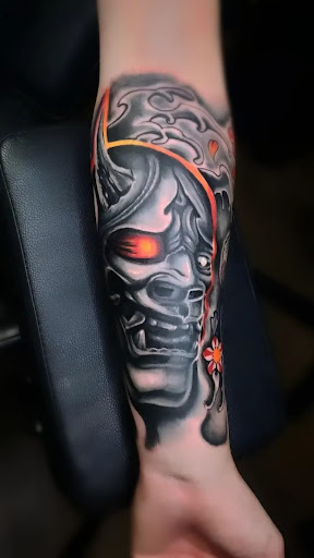 Explore tattoo ideas for wrist for guys, creative tattoo ideas in Titusville, available at Space Coast Ink Tattoo Studio