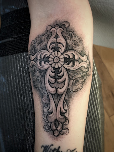 Explore fine line tattoo ideas for guys, creative tattoo ideas in Magnolia, available at Mr. Grays Tattoo Studio