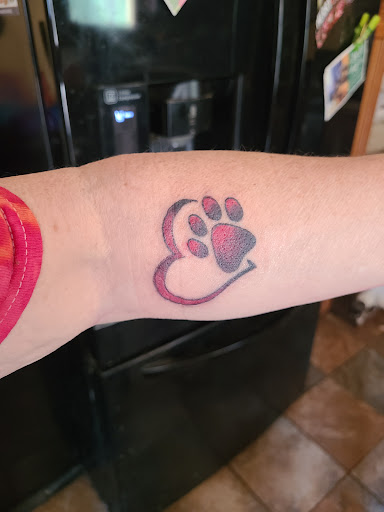 Find planet tattoo ideas for your next unique tattoo in Bridgeport at Pike Street Studios Tattoo and Body Piercing