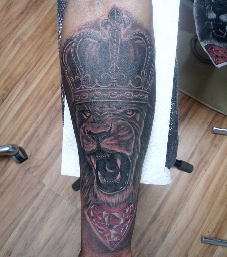 Explore tattoo cartoon ideas, creative tattoo ideas in Owosso, available at Expressions Body Art Studio