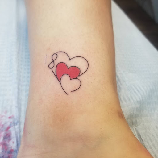 Explore cover up tattoo ideas for wrist, creative tattoo ideas in Keyport, available at Taboo Tattoos
