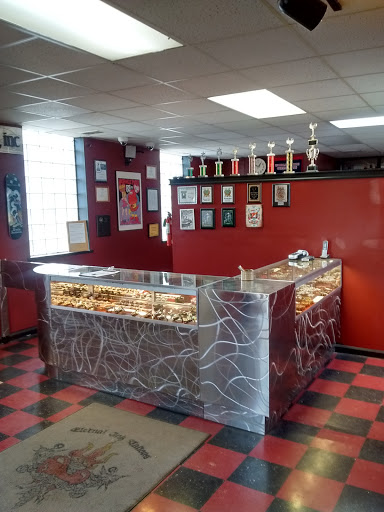 Explore book lovers tattoo ideas, creative tattoo ideas in Waterloo, available at Eternal Ink Tattoos inc