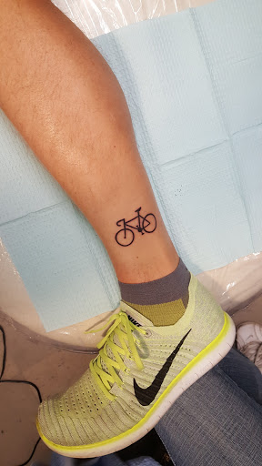 Tattoo Shop «Crossroads Tattoo», reviews and photos, 508 2nd Ave, Coralville, IA 52241, USA