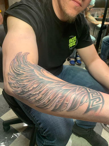 Explore tattoo ideas chest piece, creative tattoo ideas in Old Orchard Beach, available at Mad Hatters Tattoo Studio