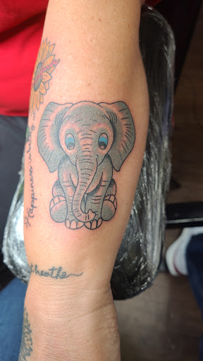 Find best back tattoo ideas for your next unique tattoo in Arlington at Depiction Tattoo Gallery