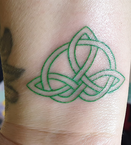 Explore back shoulder tattoo ideas for men, creative tattoo ideas in Fountain Valley, available at Lowrider Tattoo Studios