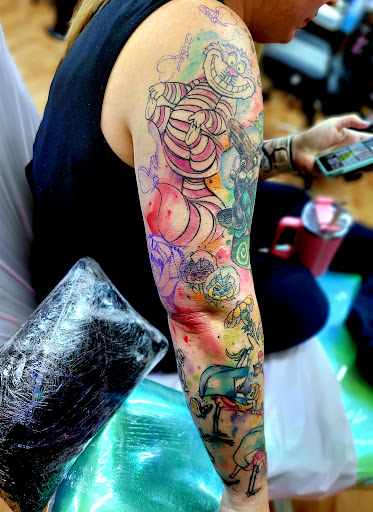 Explore barney tattoo ideas, creative tattoo ideas in Benton, available at Spectrum Tattoo