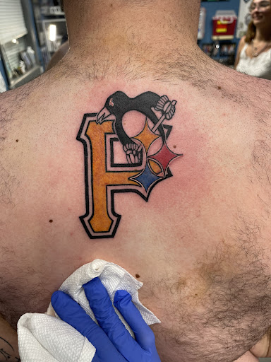 Explore son and mother tattoos ideas, creative tattoo ideas in Myrtle Beach, available at Myrtle Beach Ink