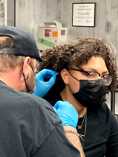 Explore girly hand tattoos ideas, creative tattoo ideas in Saint Paul, available at Black Coffin Tattoo