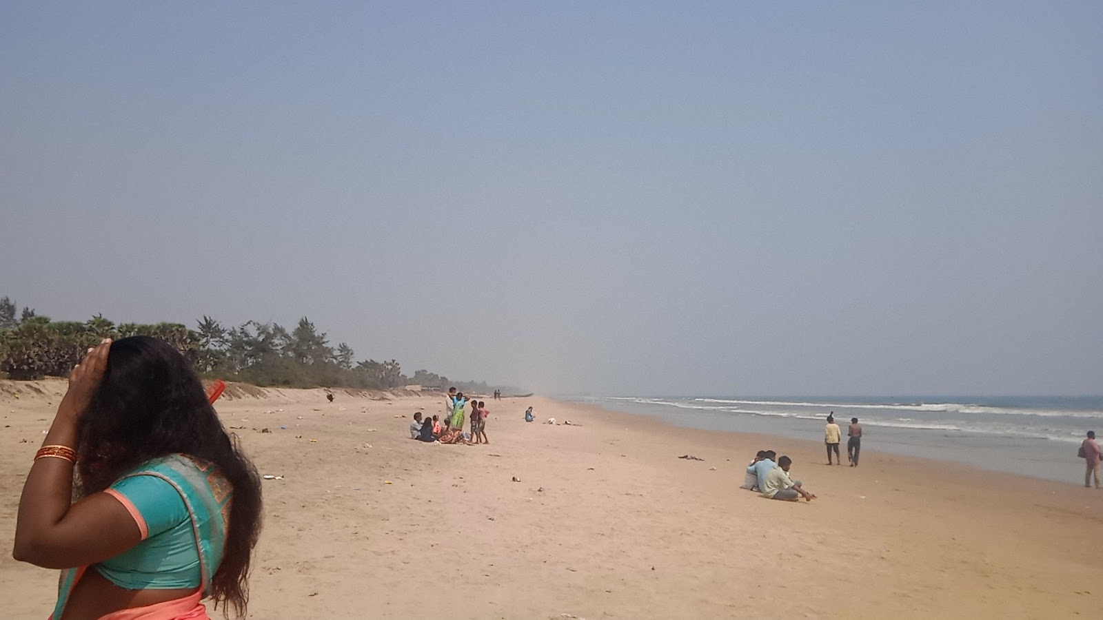 Fotografija Rajavaram Beach z dolga ravna obala