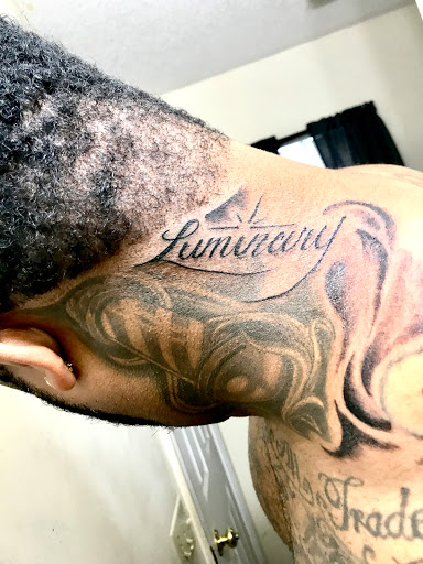 Explore front of neck tattoo ideas, creative tattoo ideas in Dalton, available at Unkut Productions Inc Tattoo Piercing Studio