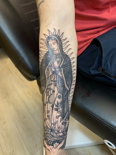 Explore black goddess tattoo ideas, creative tattoo ideas in Brunswick, available at Blue Fin Tattoos