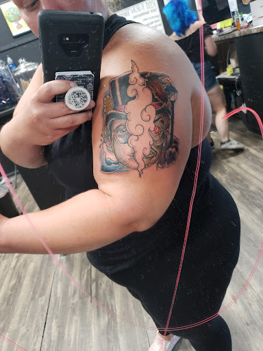 Explore dragonfly flower tattoo ideas, creative tattoo ideas in Goose Creek, available at Red Kirin Tattoo