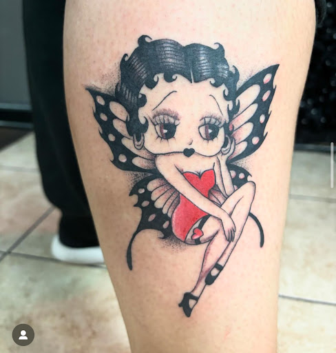 Explore cross tattoo ideas for woman, creative tattoo ideas in Houston, available at 333 Tattoo Studio HTX
