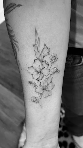 Explore cover up arm tattoo ideas, creative tattoo ideas in Hartselle, available at Lumith