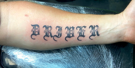 Explore quote tattoo ideas for men, creative tattoo ideas in Meridian, available at Creative Pain Tattoo Studio