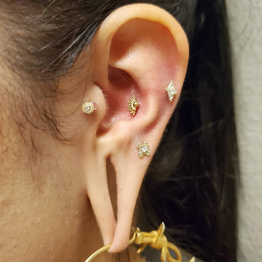 Explore ruby tattoo ideas, creative tattoo ideas in Laguna Beach, available at Cast of Crowns Art Collective