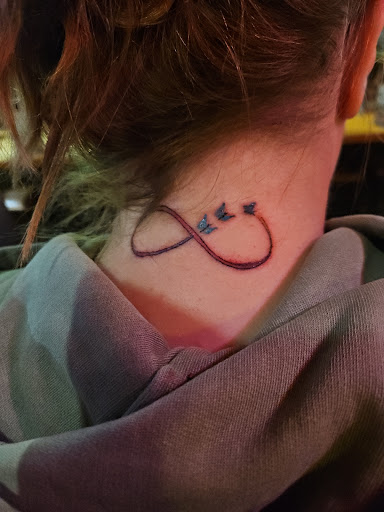 Explore to the moon and back tattoo ideas, creative tattoo ideas in Lima, available at Legacy Ink Tattoo