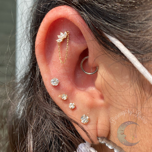 Explore floral hand tattoo ideas, creative tattoo ideas in Visalia, available at La Luna Piercings and Fine Jewelry
