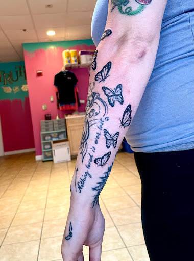 Explore january birth flower tattoo ideas, creative tattoo ideas in Berwick, available at Truth Custom Tattoo, Design & Gallery