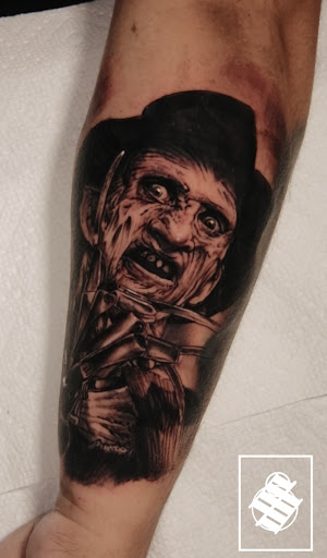 Explore parrot tattoo ideas, creative tattoo ideas in Seaside, available at Sacred 8 Studios