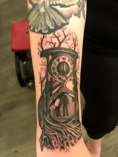 Explore mama bear tattoo ideas, creative tattoo ideas in Waxahachie, available at ExclusivE Tattoo and Barber