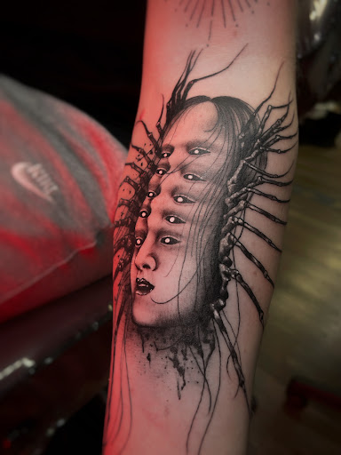 Explore triathlon tattoo ideas, creative tattoo ideas in Clarksville, available at Dark Raine Tattoo