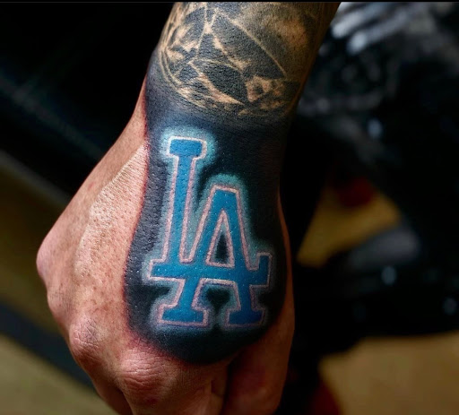 Find tattoo crown ideas for your next unique tattoo in Fort Wayne at Grade A Tattoos and Body Piercing