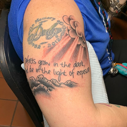 Explore men tattoo ideas leg, creative tattoo ideas in Orange Park, available at Big City Tattoo and Piercing