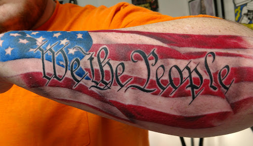 Explore arm sleeve tattoo ideas woman, creative tattoo ideas in Marietta, available at Monkeys Uncle Tattoo